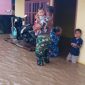 Tampak Aparat TNI yang membantu mengevakuasi warga dari ancaman bnjir (dok/terasmalut)